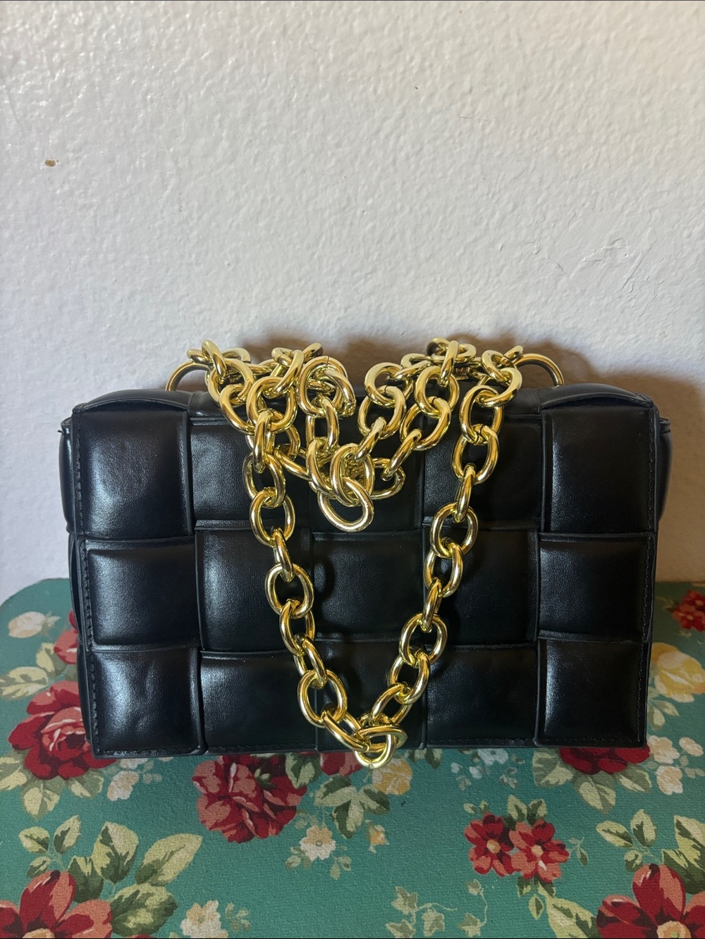 Woman’s Black Quilted Leather Shoulder Bag with Gold Chain